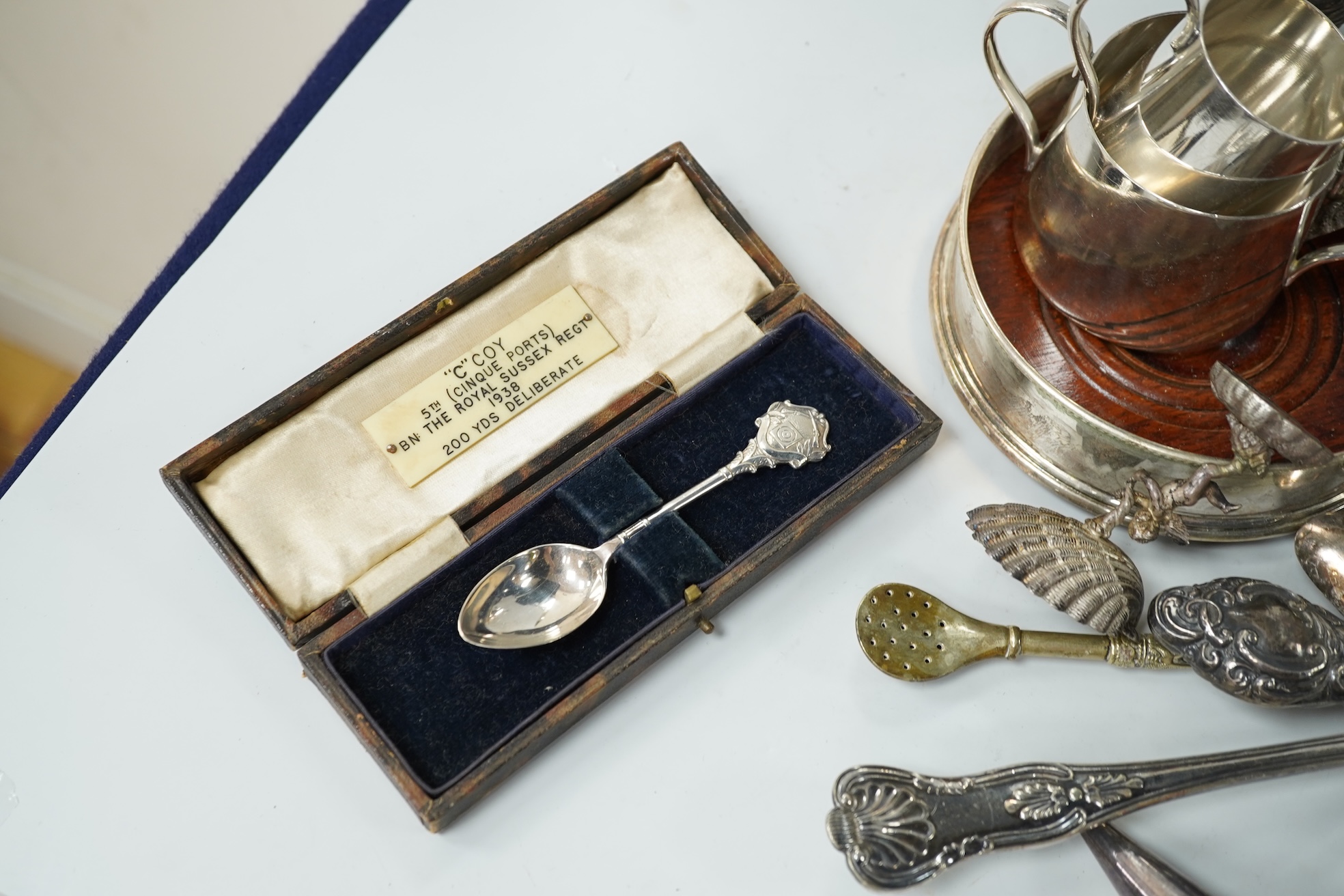 A collection of various plated wares and small silver